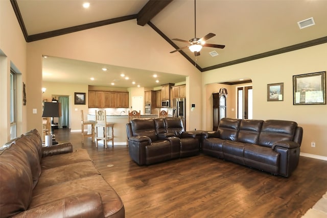 living room featuring ceiling fan, dark wood-type flooring, and high vaulted ceiling