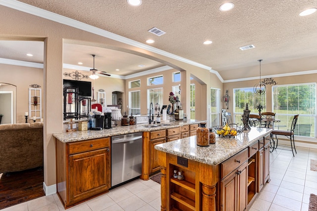 kitchen with ornamental molding, ceiling fan with notable chandelier, sink, and dishwasher