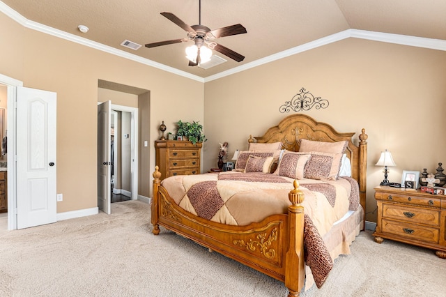 carpeted bedroom featuring crown molding and ceiling fan