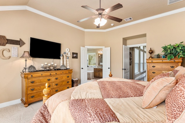 bedroom with ceiling fan, crown molding, light colored carpet, and ensuite bath