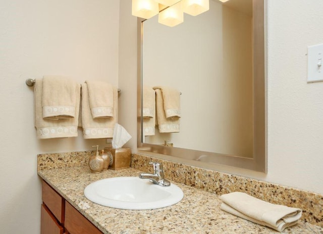 bathroom with vanity with extensive cabinet space