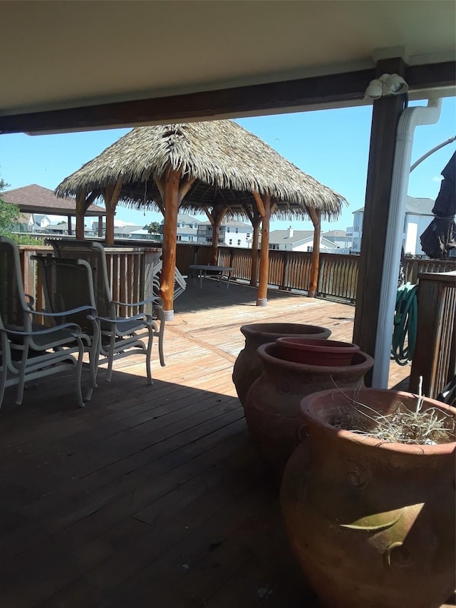 view of patio / terrace with a wooden deck and a gazebo