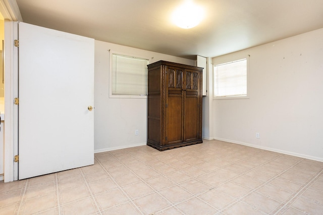 empty room with light tile flooring