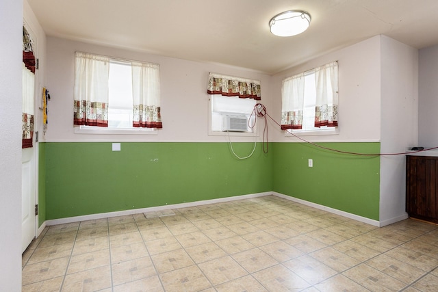 spare room with light tile flooring