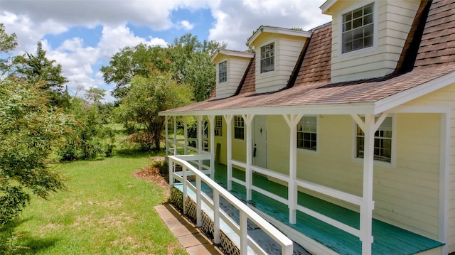 view of property exterior featuring a yard