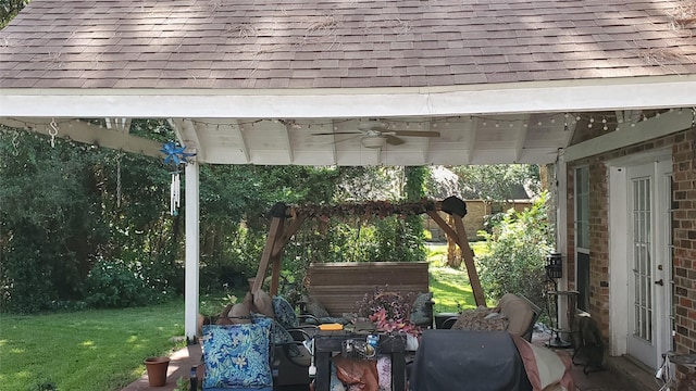 view of patio / terrace with a pergola and ceiling fan