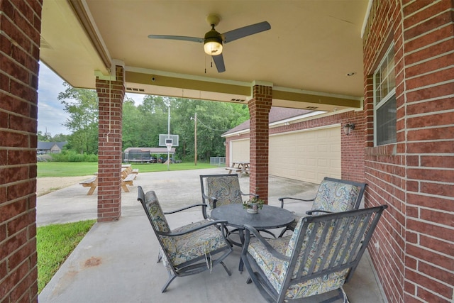 view of terrace featuring ceiling fan