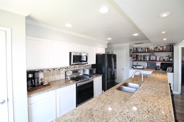 kitchen with stainless steel appliances, backsplash, sink, dark hardwood / wood-style floors, and white cabinets