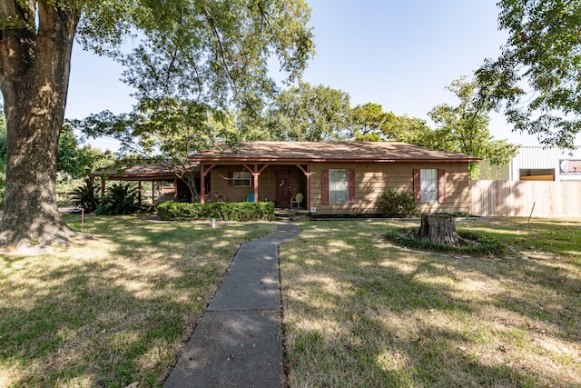 single story home featuring a front yard