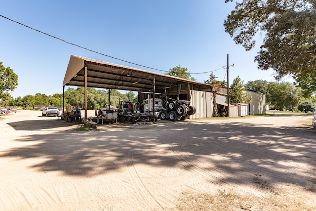 view of car parking featuring a carport