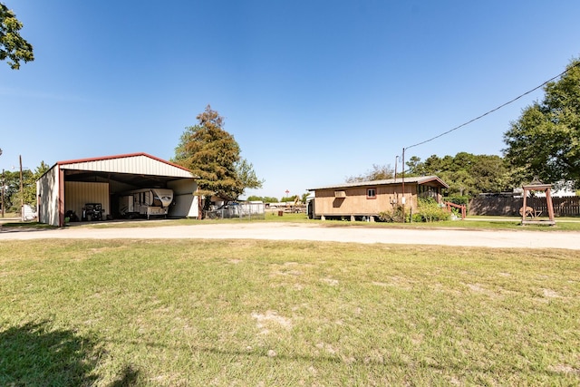 view of yard with a carport