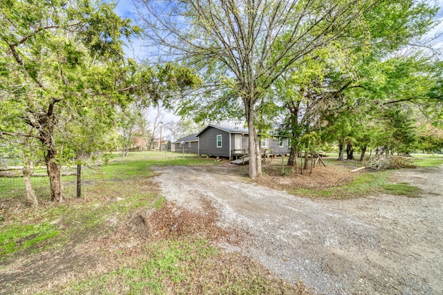 view of yard featuring a deck