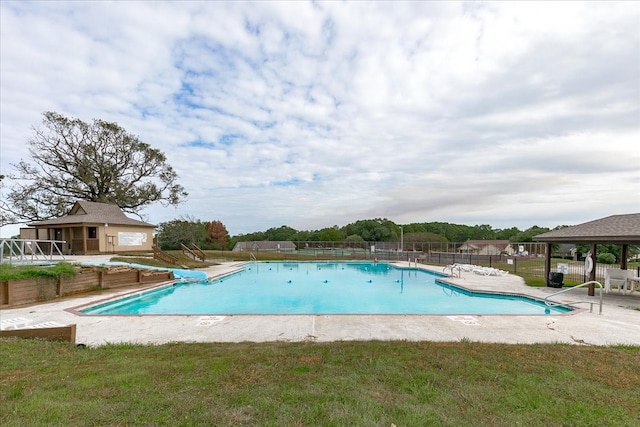 view of swimming pool featuring a patio area