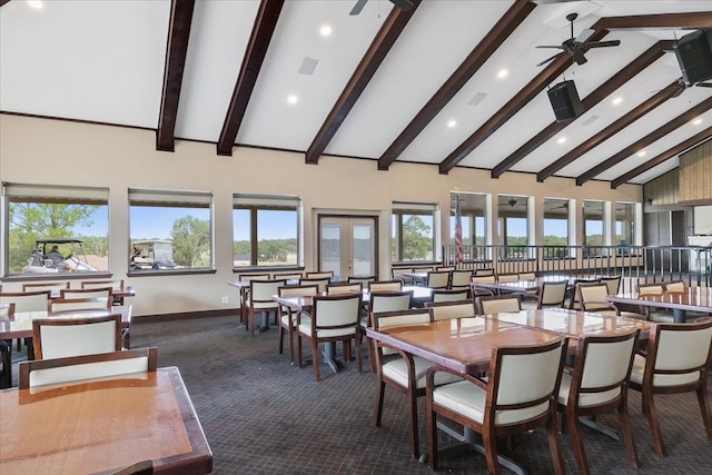 dining room with french doors, ceiling fan, dark colored carpet, high vaulted ceiling, and beam ceiling