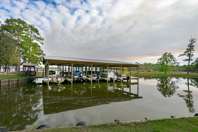 dock area featuring a water view