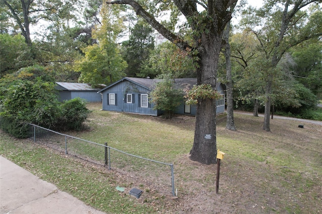 view of front of home with a front lawn