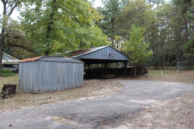 view of outdoor structure with a carport