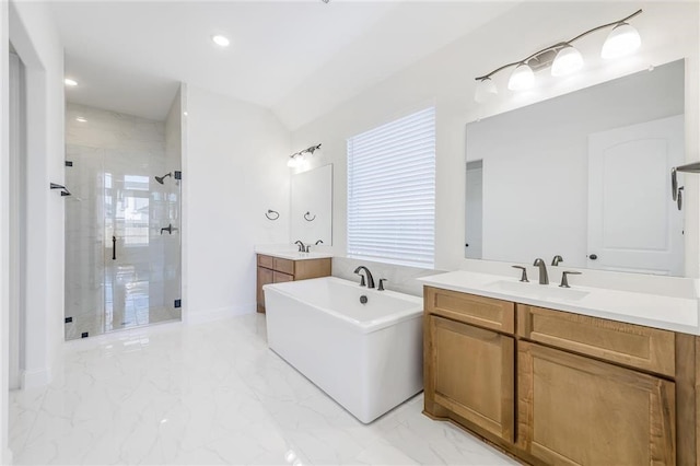 bathroom featuring tile floors, large vanity, and separate shower and tub