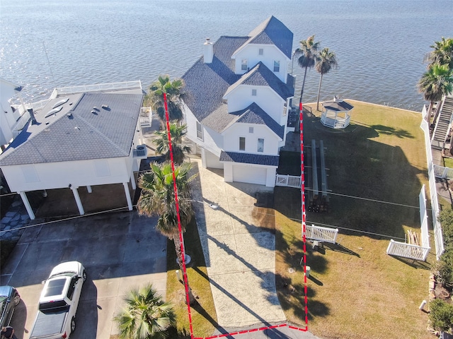 drone / aerial view featuring a water view