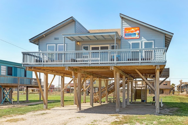 back of property featuring a wooden deck