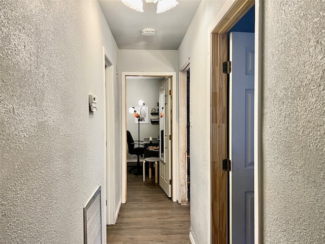 hall featuring wood-type flooring