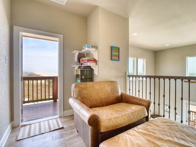 interior space featuring a healthy amount of sunlight and light hardwood / wood-style flooring