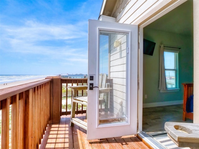 balcony featuring a water view