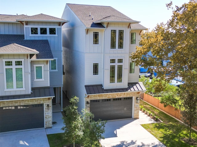 view of front of home with a garage