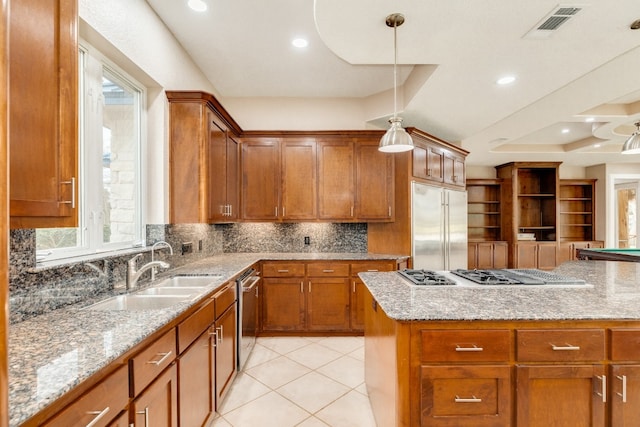 kitchen with stainless steel appliances, backsplash, plenty of natural light, and light tile floors