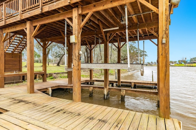 dock area featuring a water view