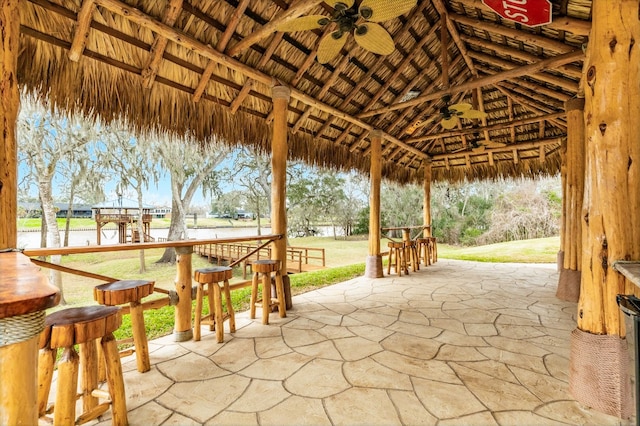 view of patio with a gazebo and ceiling fan