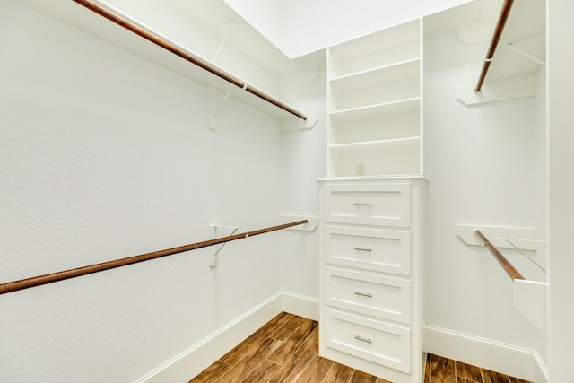 walk in closet featuring light wood-type flooring