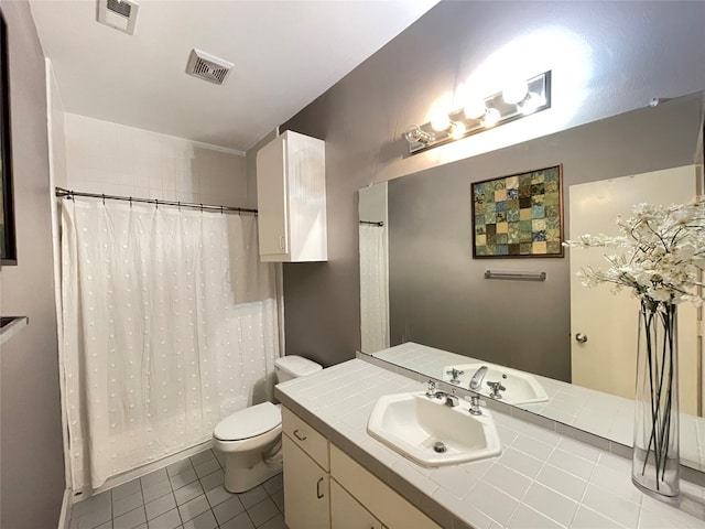 9822 Samantha Suzanne Ct, Houston, TX 77025 - bathroom featuring toilet, tile floors, and vanity