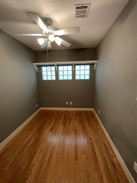 9822 Samantha Suzanne Ct, Houston, TX 77025 - spare room featuring light hardwood / wood-style floors and ceiling fan