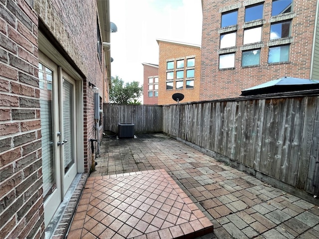 9822 Samantha Suzanne Ct, Houston, TX 77025 - view of terrace with central AC unit