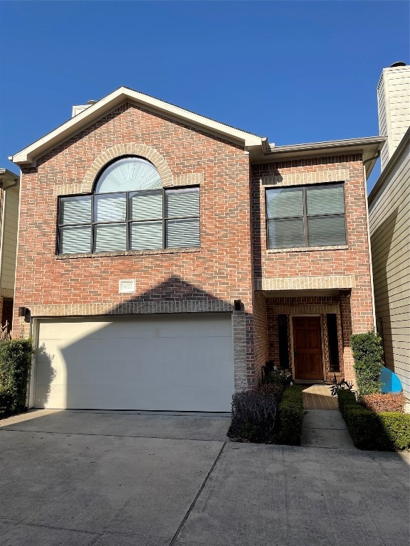 9822 Samantha Suzanne Ct, Houston, TX 77025 - view of front of property featuring a garage