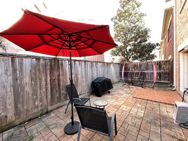 9822 Samantha Suzanne Ct, Houston, TX 77025 - view of terrace featuring grilling area