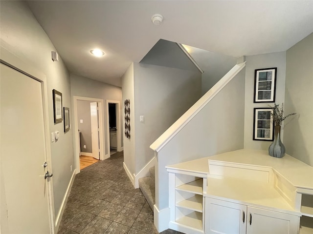 9822 Samantha Suzanne Ct, Houston, TX 77025 - corridor with dark tile flooring