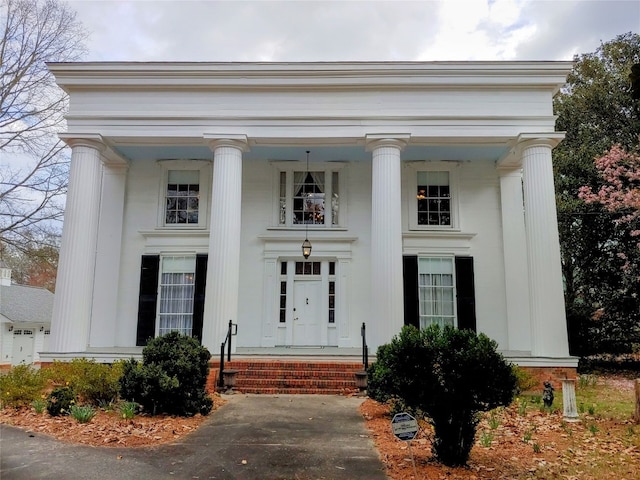 neoclassical / greek revival house with a porch