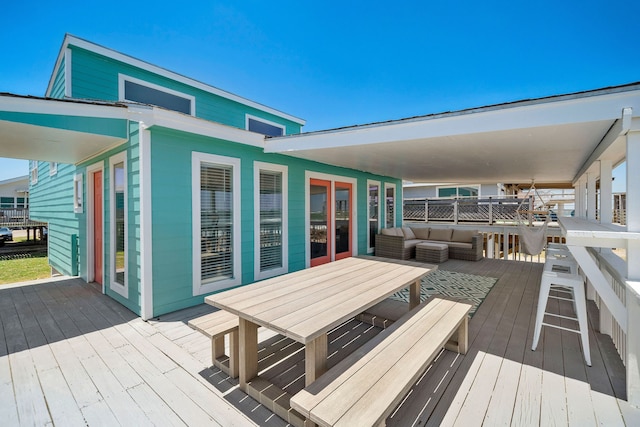 deck with an outdoor hangout area