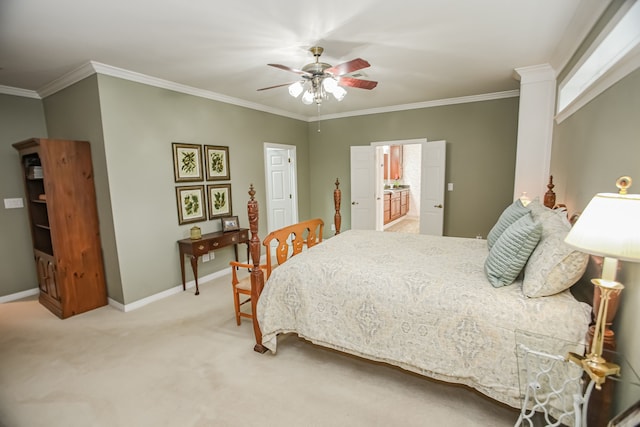 carpeted bedroom featuring ensuite bathroom, ornamental molding, and ceiling fan