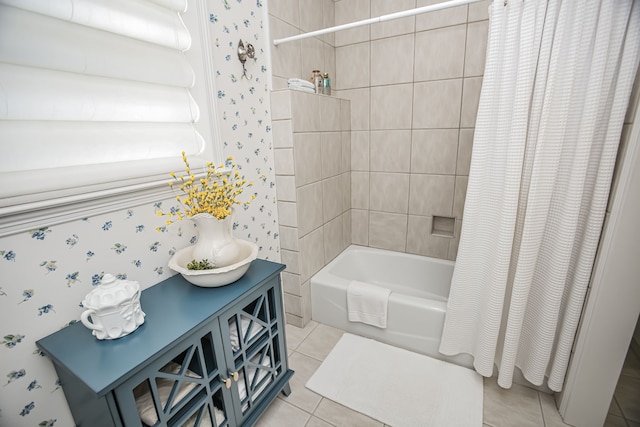 bathroom with shower / bath combination with curtain and tile flooring