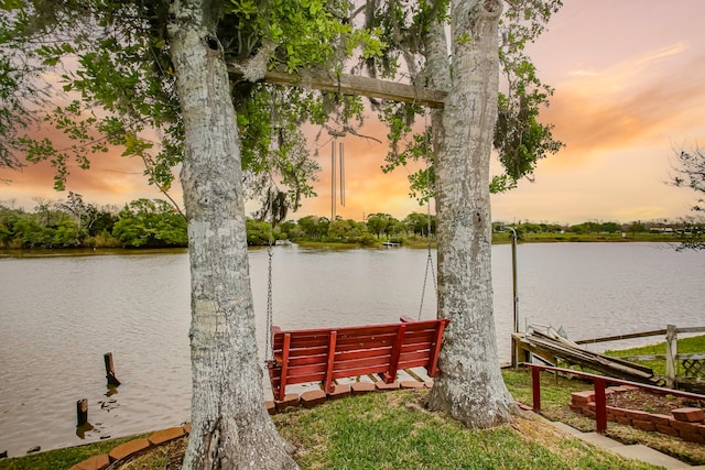 view of dock with a water view