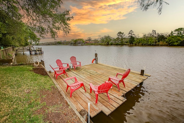 view of dock with a water view