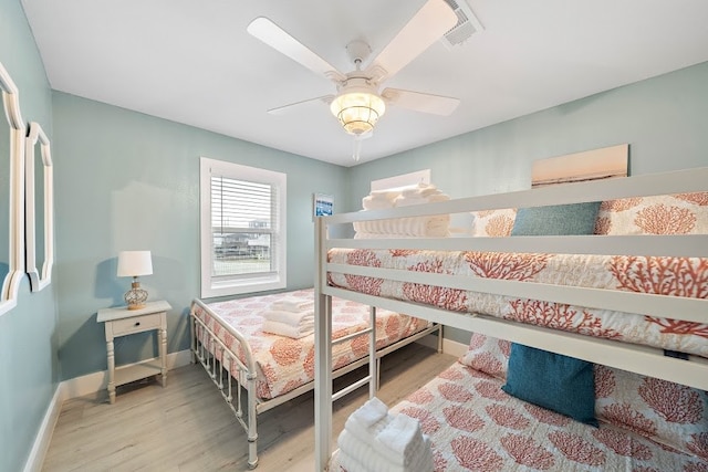 bedroom featuring ceiling fan and light wood-type flooring