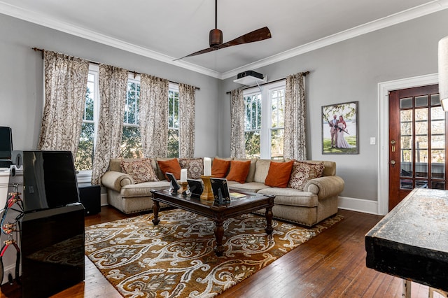 living room featuring crown molding, dark hardwood / wood-style floors, and ceiling fan