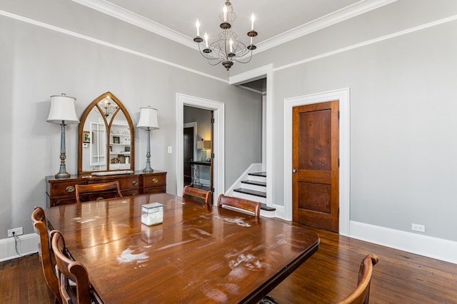 dining area featuring a chandelier, crown molding, and dark hardwood / wood-style flooring