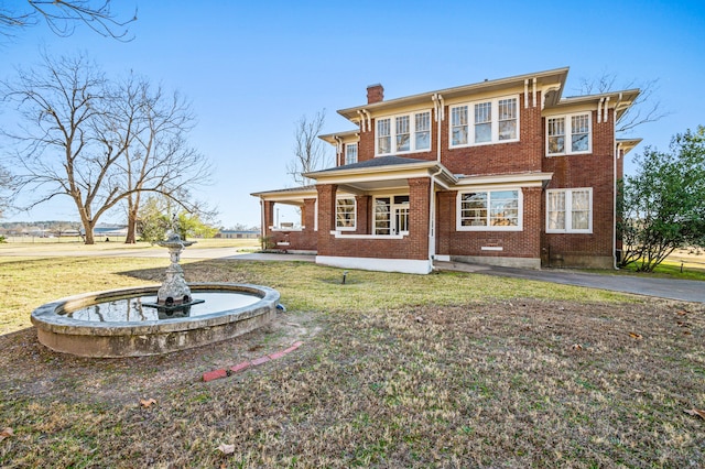 view of front of house with a front yard