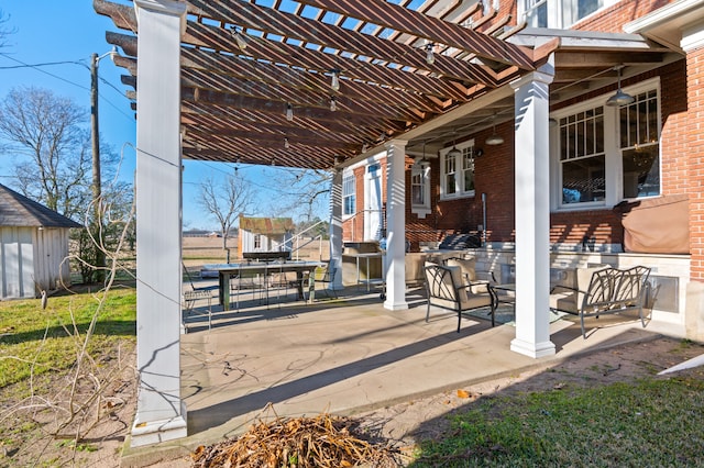 view of terrace with a pergola