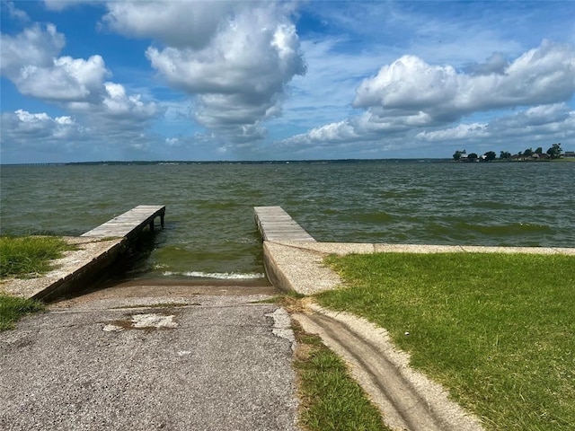 dock area featuring a water view